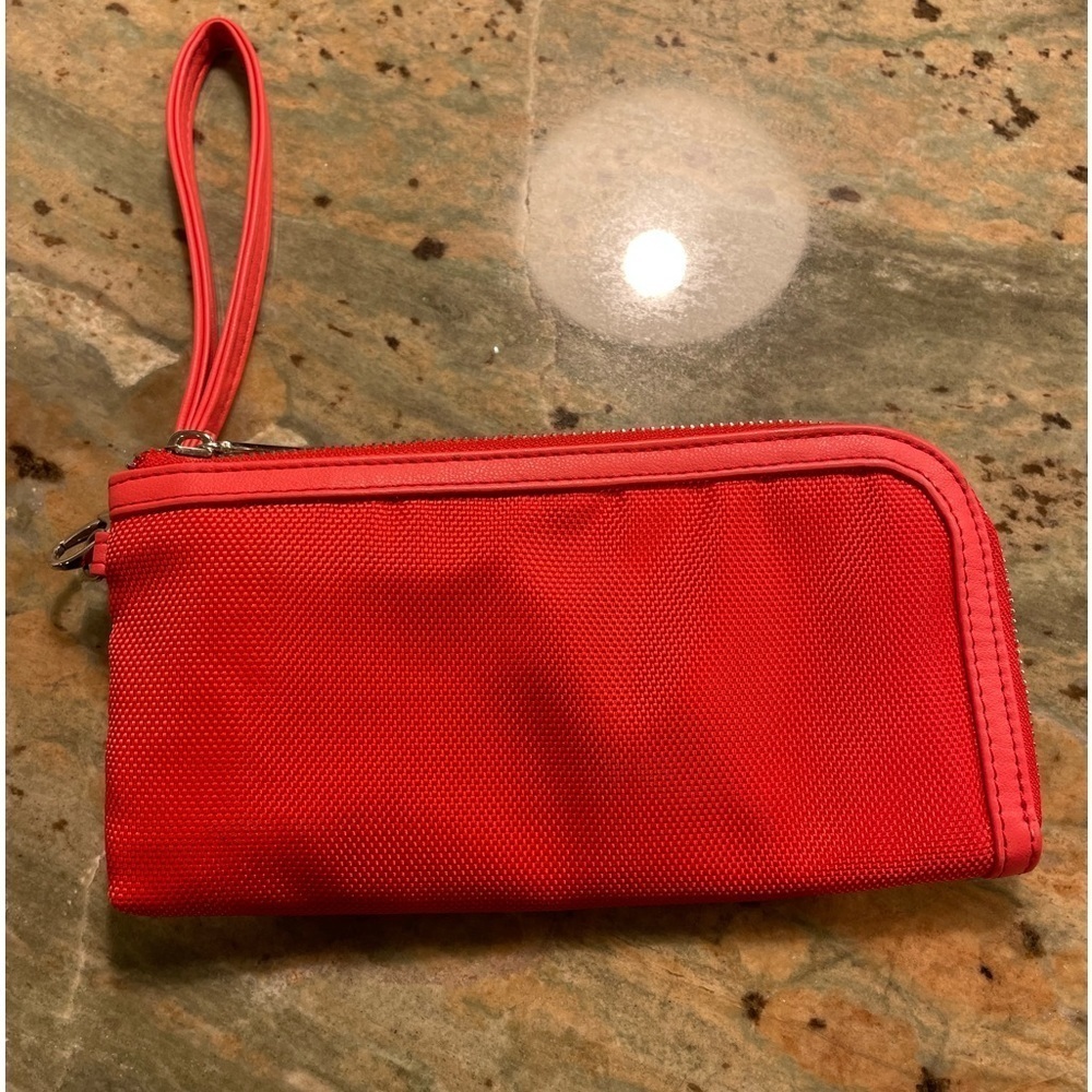 TRIPLE C NWOT wristlet with USB phone charger in orange/red